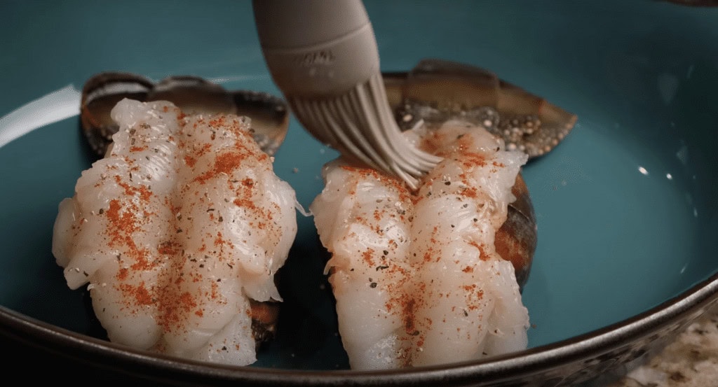 brushing with butter